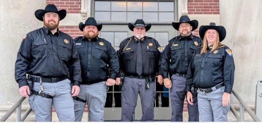 Sherrif Jeffrey Pounds (middle), undersherrif Michael McEachern, and deputies Luke Hayes, Bailey Davidson and Jason Wolfe